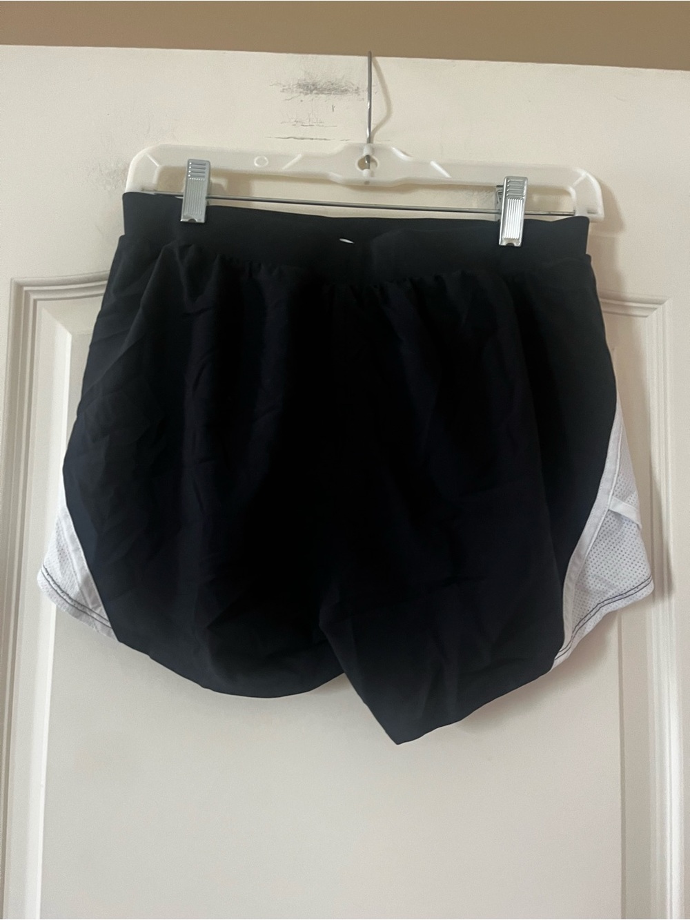 Under Armour Women’s Black Running Shorts with White Trim Size Small - Picture 2 of 8